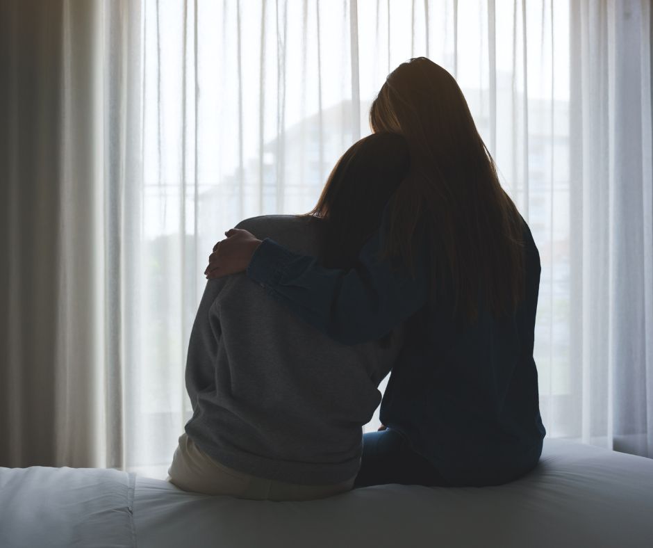 Couple comforting each other